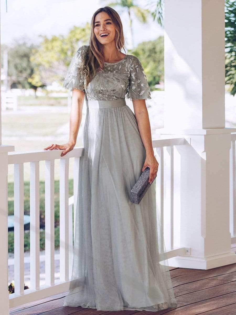 Robe longue de cérémonie à manches courtes avec broderie