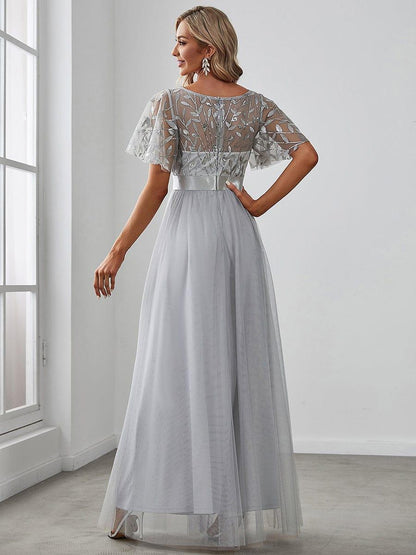 Robe longue de cérémonie à manches courtes avec broderie